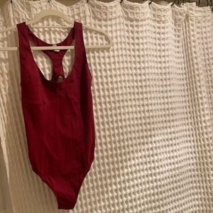 free people movement swim suit . Red. Size small. Fits perfectly.